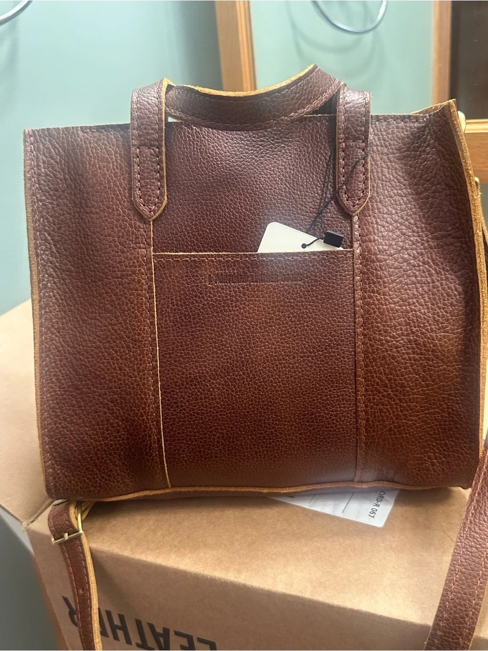 Portland Leather Lola crossbody tote. Color is Ashville - Picture 2 of 3